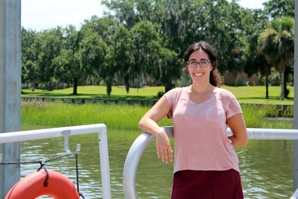 Natalie Cohen stands on the SkIO dock.