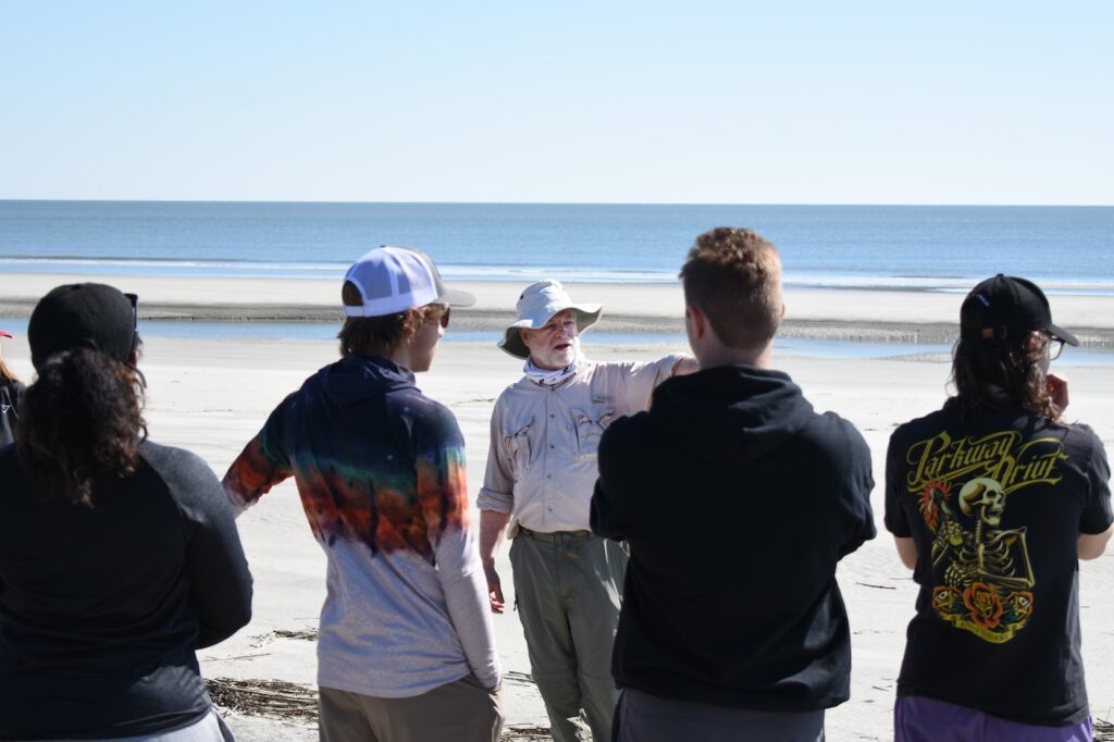 SkIO director Clark Alexander talks to students about Wassaw's geological development. 