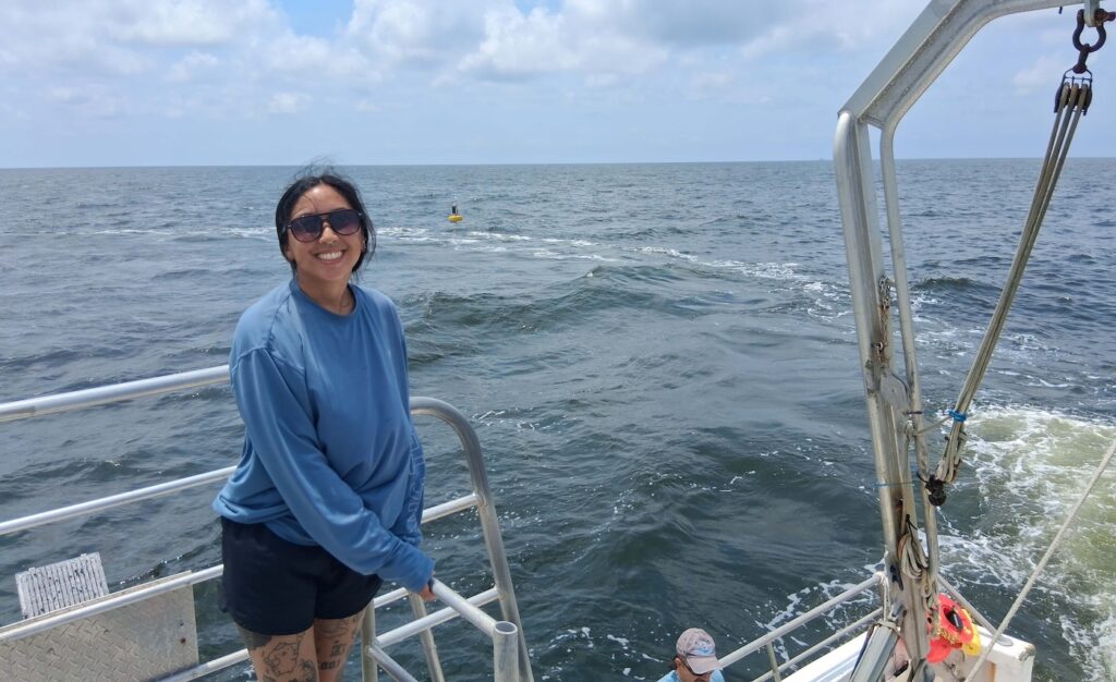 Sarah McCaffrey on the Dauphin Island Sea Lab's R/V E.O. Wilson, checking in on a buoy.